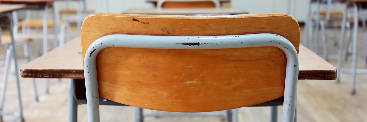 Fear of School Shootings Is Giving Students Anxiety and Depression Empty classroom full of desks