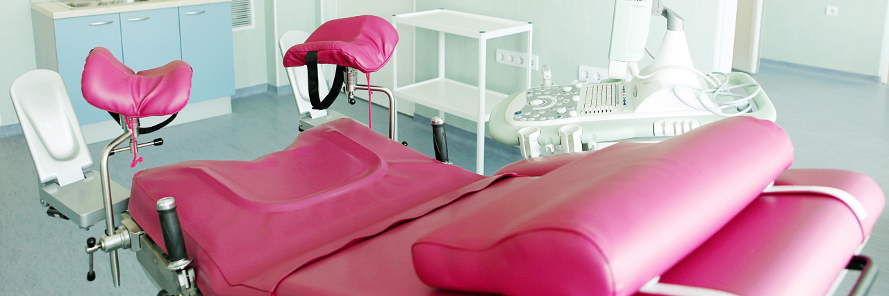 a pink gynecological chair