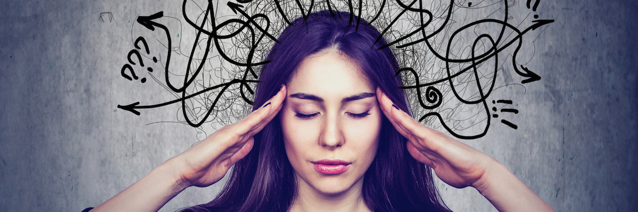 Why a Dissociative Identity Disorder Diagnosis Is Important A woman with lines above her head