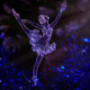Glass figure of ballet dancer.