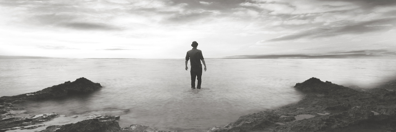 Prejudice Against People With Mental Illness Is Still Wide-Spread A man standing in the sea
