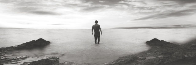 A man standing in the sea