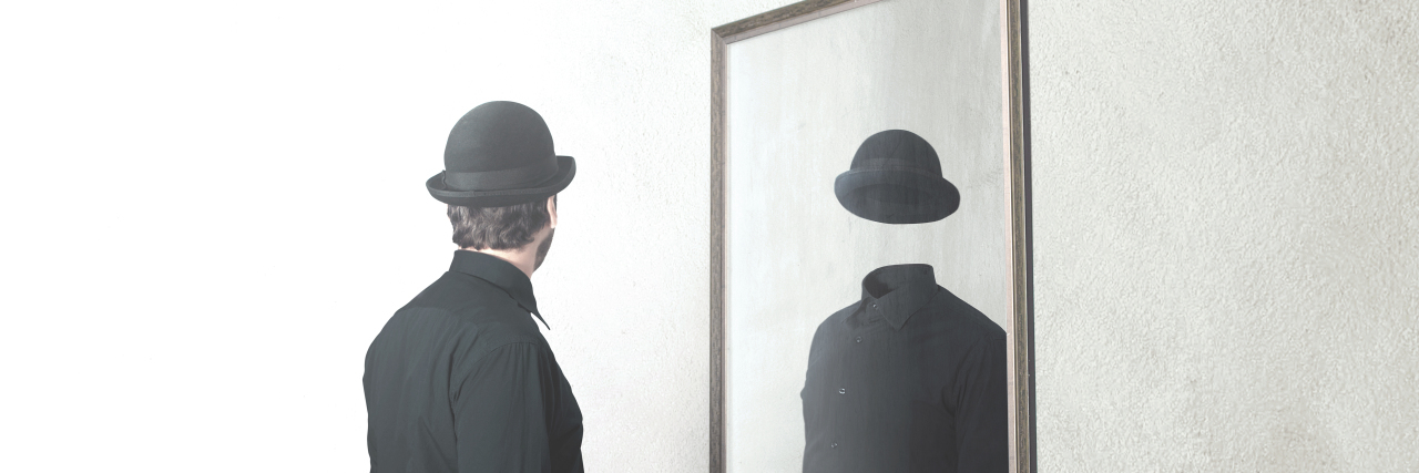 Choosing to Hide or Disclose an Invisible Disability Man invisible in the mirror.