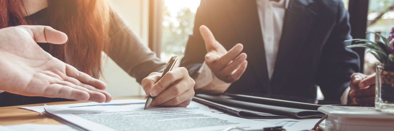 Finding the Right Job With Fibromyalgia Workers collaborating in a meeting.