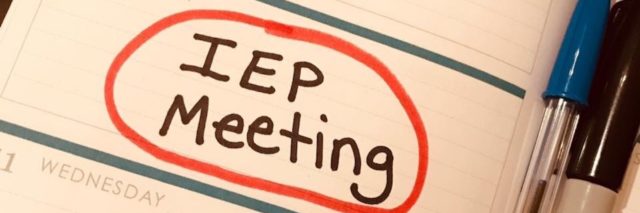 Planner with words "IEP meeting" circled