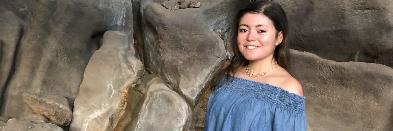 Going to College With Epidermolysis Bullosa and Experiencing Fear The author, smiling with her hands and legs bandaged