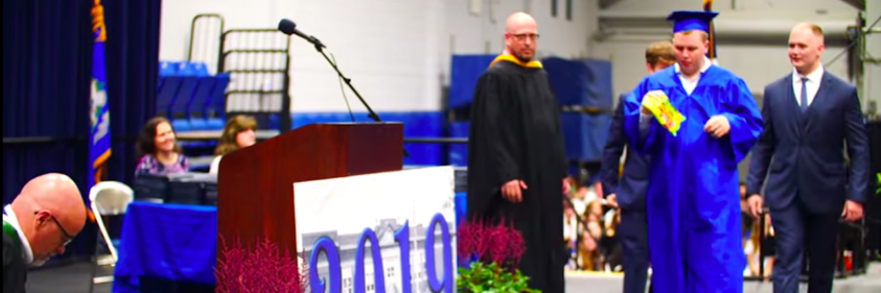 High School Gives Autistic Student Silent Graduation Autistic student Jack Higgins walks at his Carmel High School graduation in New York