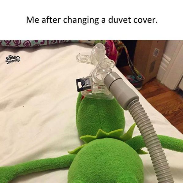 me after changing a duvet cover: kermit the frog with an oxygen mask over his face