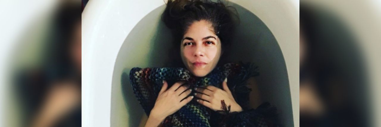 Selma Blair Posts Photo of Coping Mechanism for Multiple Sclerosis Selma Blair in bath with heavy towel