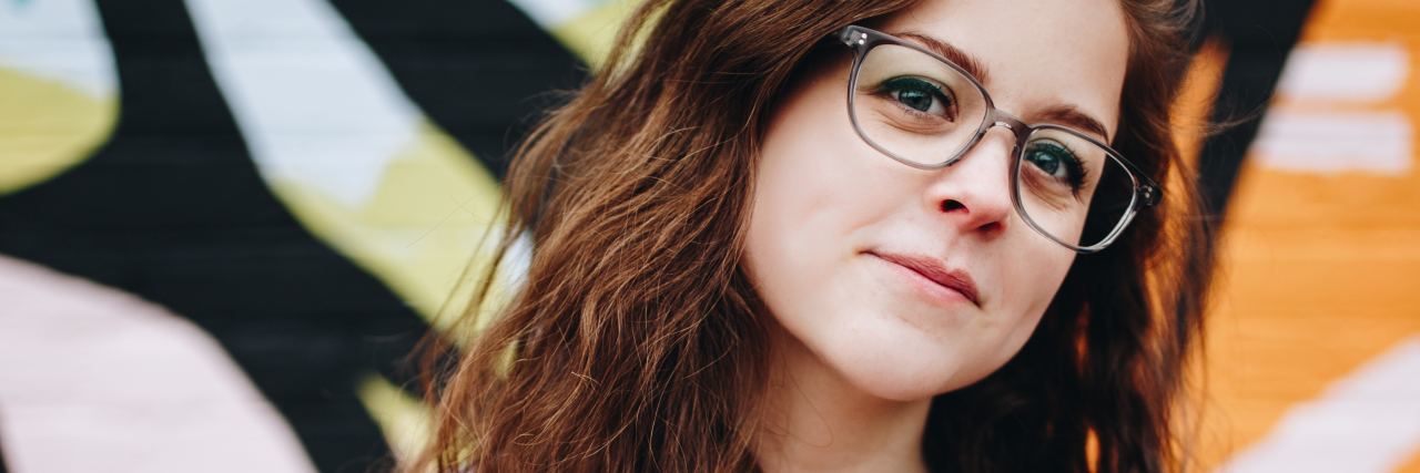 Importance of Freedom as a Student With Depression photo of young student looking at camera and smiling