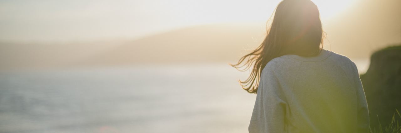 Why Giving False Hope About Cancer Is Worse Than No Hope woman looking at ocean