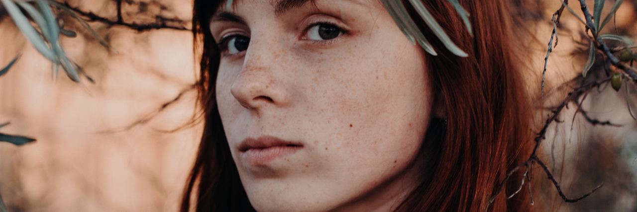 An Introduction to Premenstrual Dysphoric Disorder (PMDD) A woman who's sad