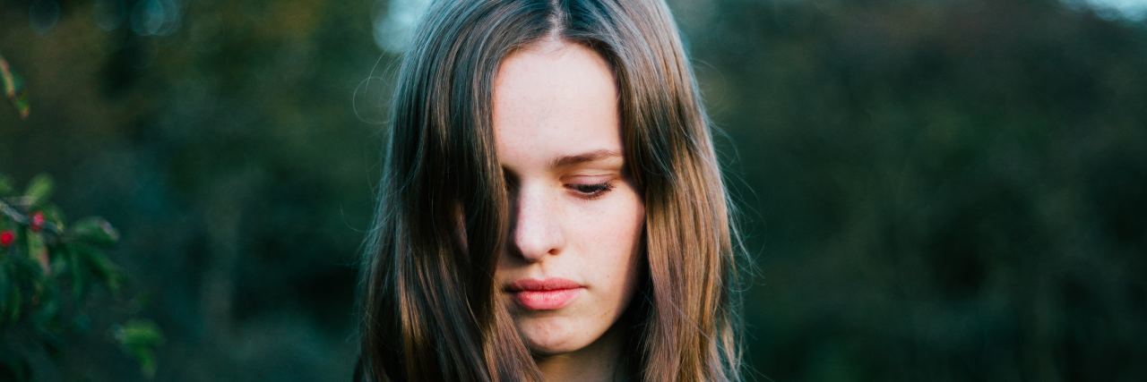 Woman with eyes closed, portrait style