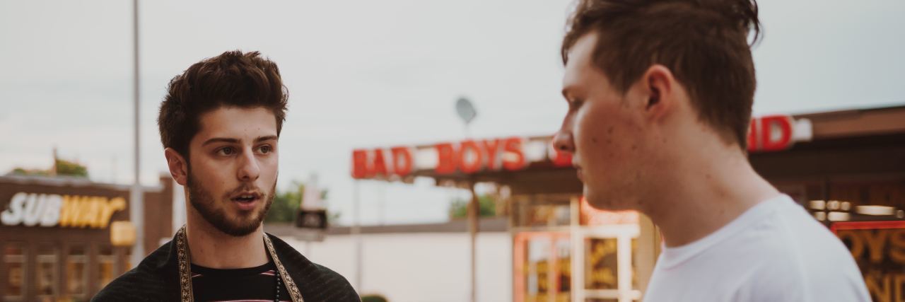 When They Ask How You Are but You’re Not Fine two men talking outside