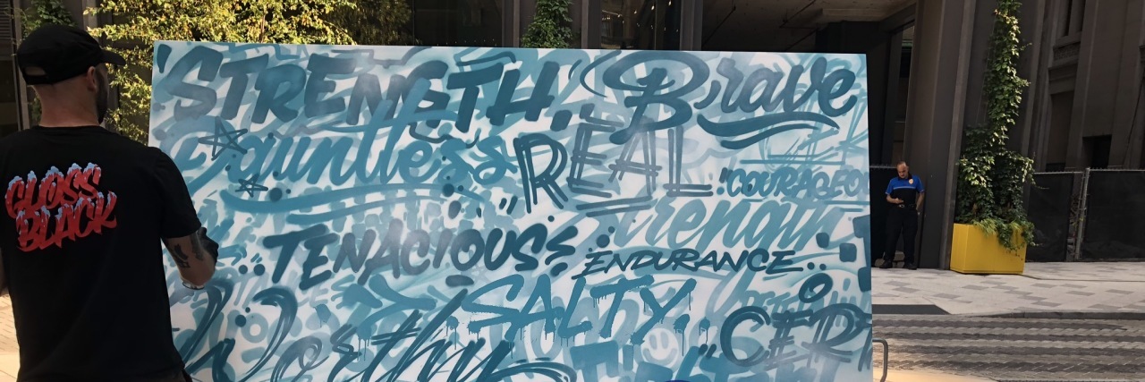 The Benefits of Attending Patient Conferences for Dysautonomia Philadelphia graffiti artist MECRO finishes a mural of words from people who live with dysautonomia.