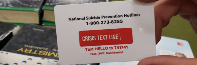 Suicide prevention info on the back of a student ID in California