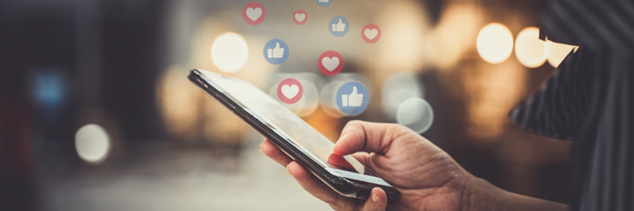 Coming Out About Mental Health on Social Media Hand using smartphone with Social media concept.