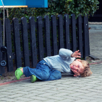 Boy on ground having a meltdown
