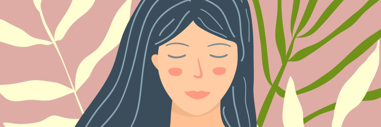 Finding the Power of Self-Acceptance A woman stands out in nature with her eyes closed at peace