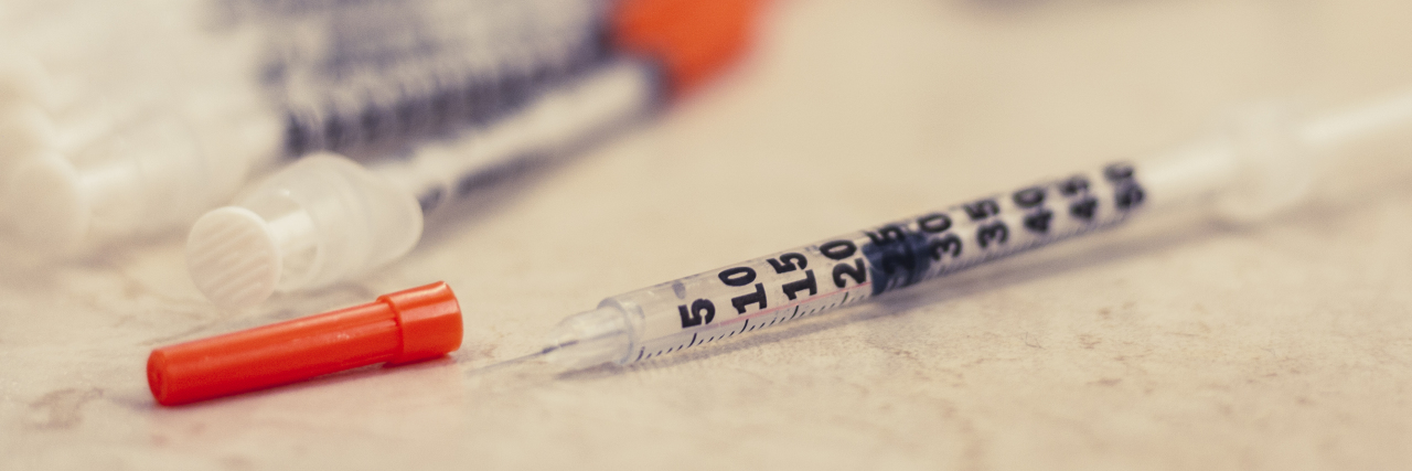 Man With Diabetes Dies After Taking Cheaper Insulin to Save Money Pile of medical syringes for insulin for diabetes in woman hand