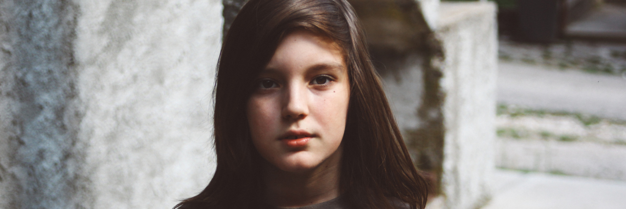 To an Anxious Child as a New School Year Begins Child looking serious at camera