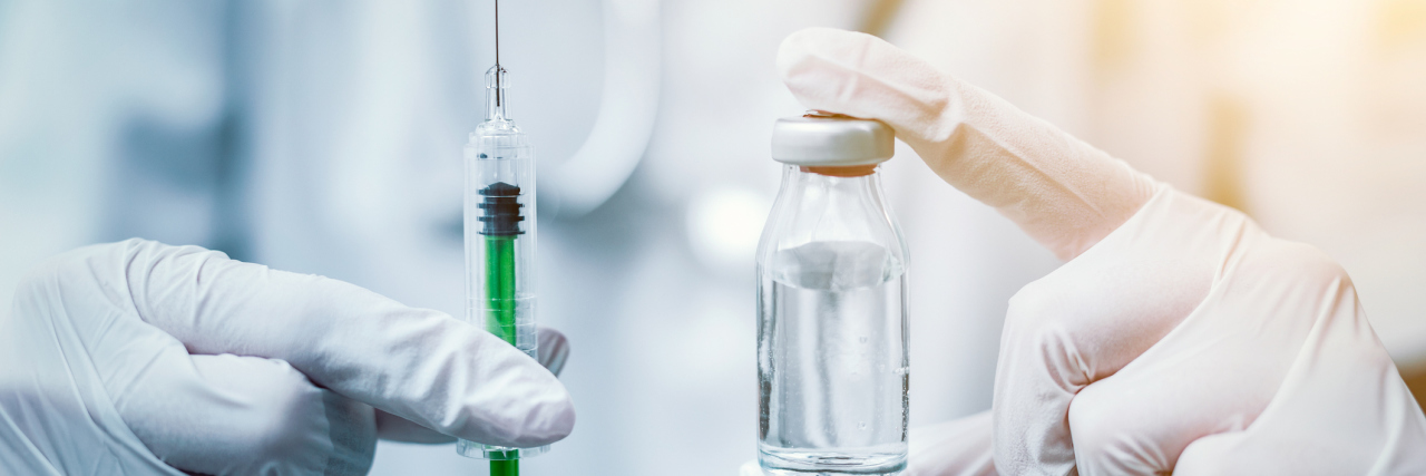People With Diabetes Aren't Using Eli Lilly's Cheap Insulin Lispro Syringe, medical injection in hand. Vaccination equipment with needle.