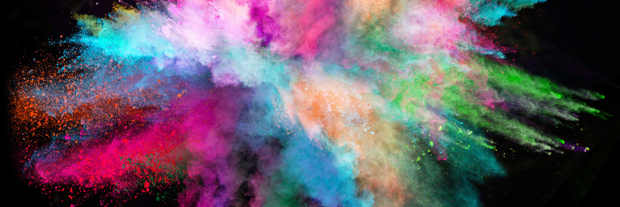 Colorful rainbow powder explosion.