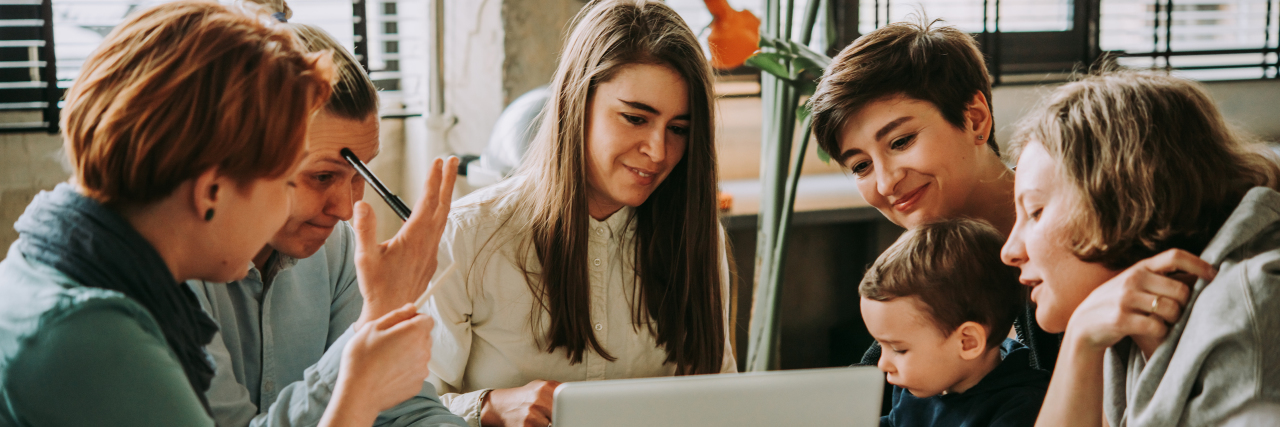 How Educators Can Support Parents at an IEP Meeting Teachers, parent and child at IEP meeting.