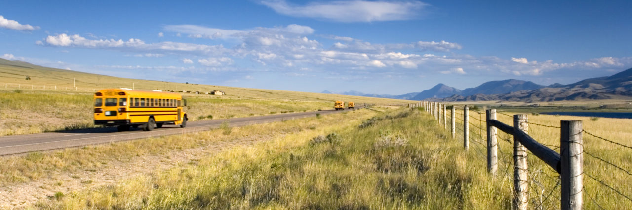 Growing Up With Learning Disabilities in a Rural Area School bus on rural road.