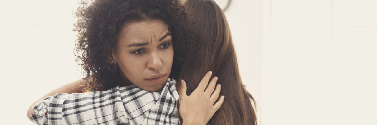 Dear Friend Whose Child Has a Chronic Illness Woman hugging friend for support