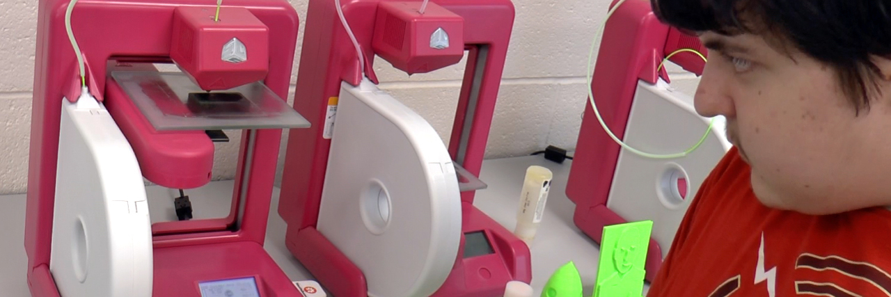 3D Printing Teaches Job Skills to Teens on the Autism Spectrum Henry using a 3D printer at YouthQuest.