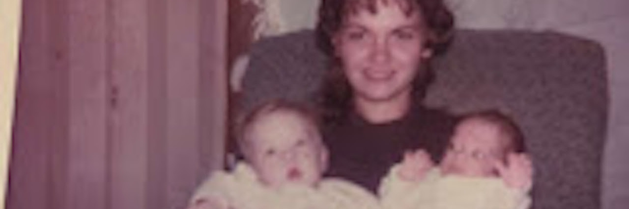 When I Interviewed a Down Syndrome Trailblazer a young mother holding her two young sons