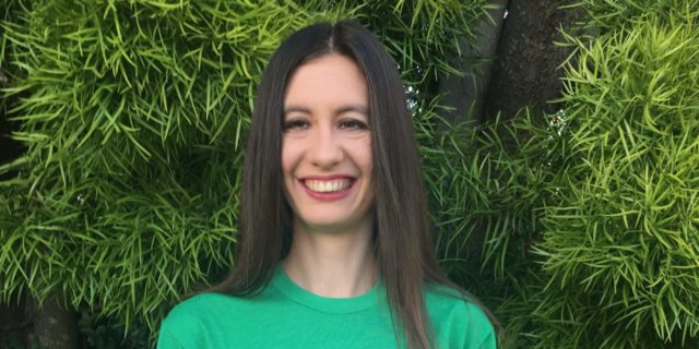 Why I'm Creating My Own Media Representation of Cerebral Palsy Kelly wearing a Go Green for CP t-shirt.