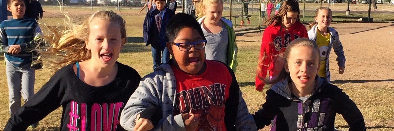 Why Inclusion IEPs Should Be Available to Every Child Michelle's son playing outdoors with friends.