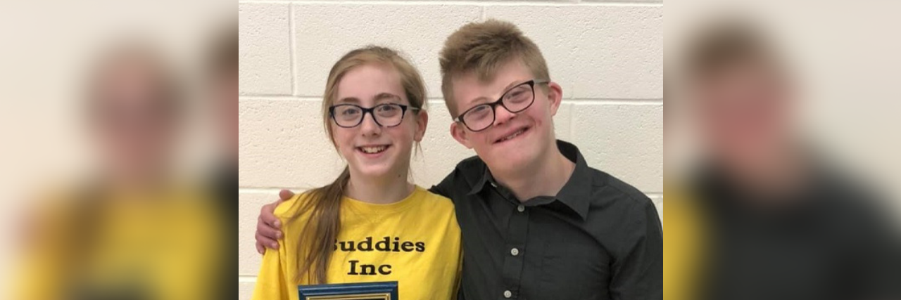 Dear Parents of 'Typical' Kids, We Need You as Allies in Our Schools Boy with Down syndrome and sister smiling at camera at school