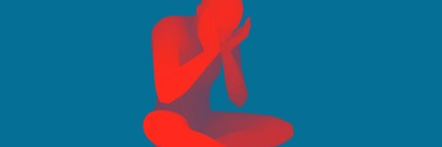 Sad red man with head in hands against blue background