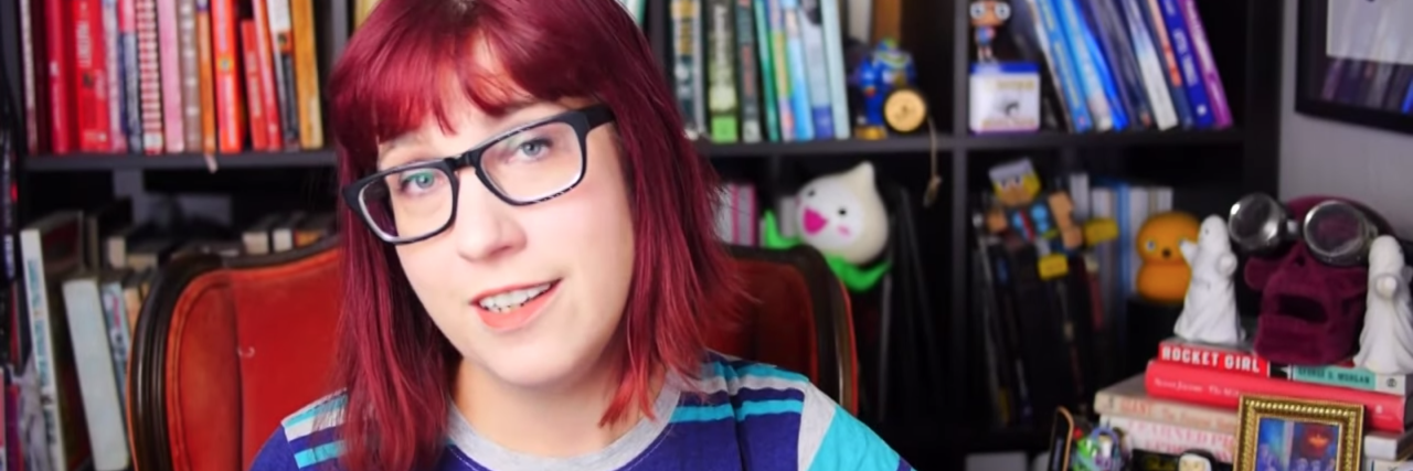 Response to YouTuber Rebecca Watson Who Called Lyme Disease a 'Scam' photo of YouTuber Rebecca Watson from video on Lyme Disease, smiling in conversation with audience