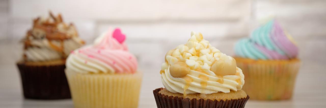 Food Allergies Are Not a Joke Cupcakes on table.