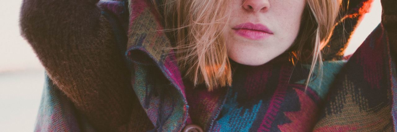 Why You Need to Stop Touching People's Self-Harm Scars photo of woman with focus on her outfit with skin covered and blonde hair