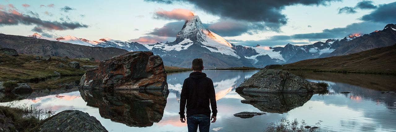 Basic Self-Care Seems Impossible With Major Depression man standing in front of distant mountain