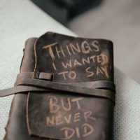 Leatherbound book that says "things I wanted to say but never did"