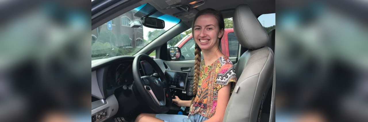 Driving With Adaptive Equipment as a Person With a Disability Sarah Todd after getting her driver's license.