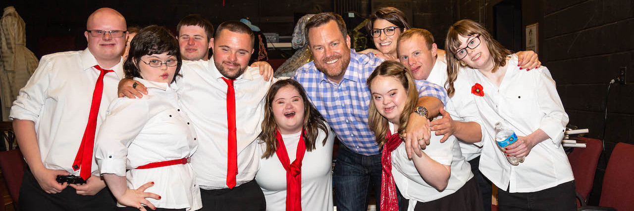 Improvaneers are the First All-Down Syndrome Improv Comedy Group the Improvaneers cast with Rob Snow backstage
