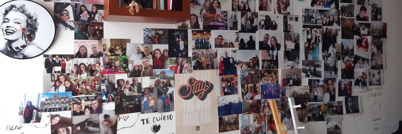 photo of contributor's wall covered in photos that make her happy