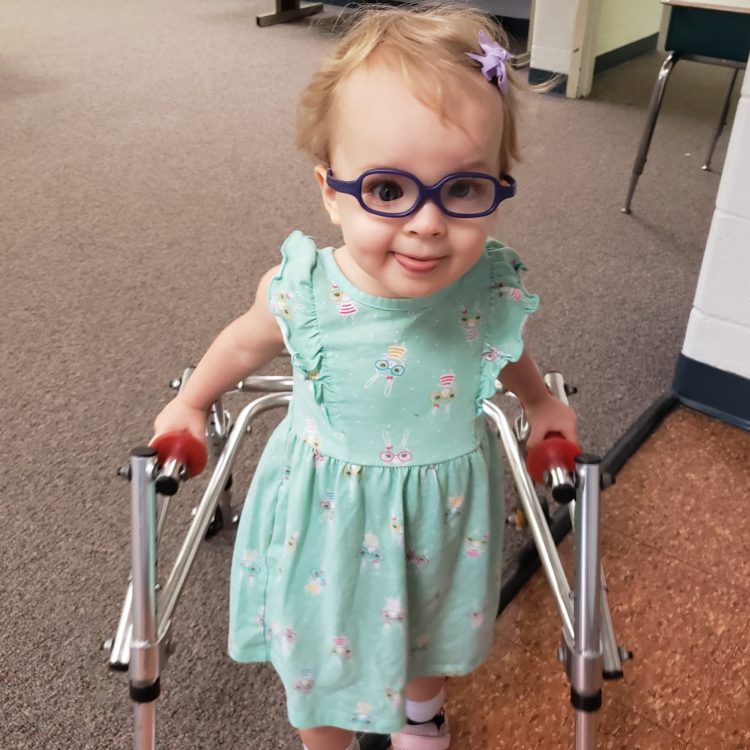 The author's daughter in her walker