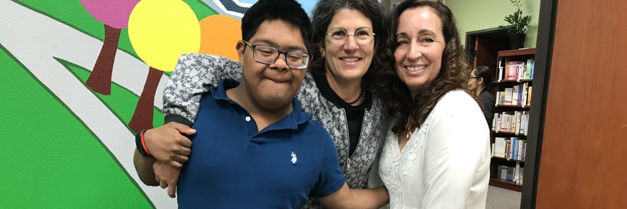 Michelle Tetschner's son smiling with friends.