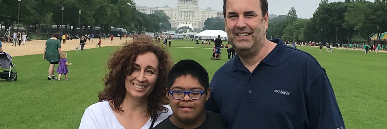 Encouraging Young Adults With Down Syndrome to Be Independent Michelle with her husband and son.