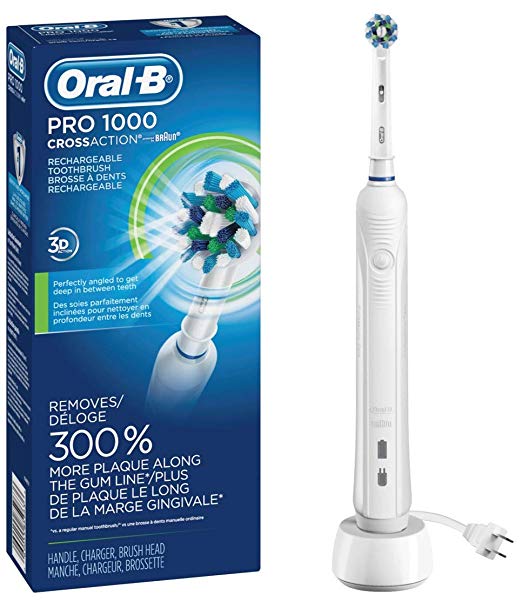 oral b pro 1000 electric toothbrush next to box