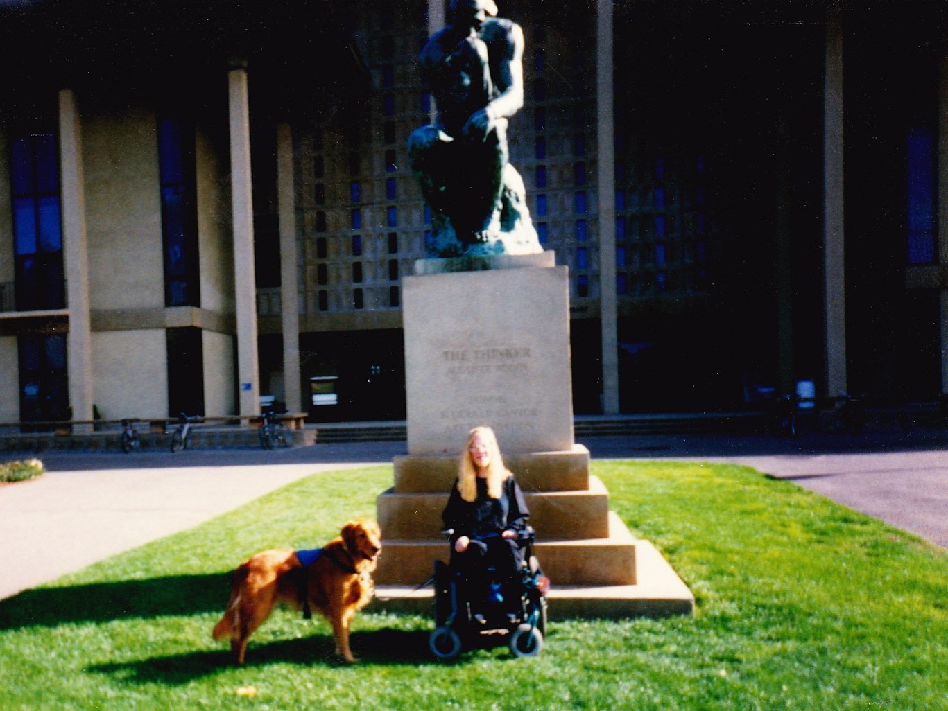 Karin poses in front of "The Thinker" while a student at Stanford University.