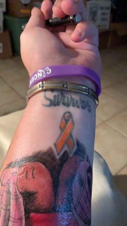 survivor with orange ribbon